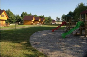 Blockhütte mit Terrasse, Garten und Grill, Gleznowo